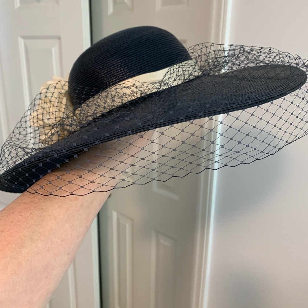 Broadbanded hat with large flower and veil. Navy with dusty cream ribbon &flower
